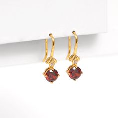 Explore our exquisite Garnet Dangle Earrings, crafted to effortlessly enhance your sparkle. These lightweight garnet diamond dangle earrings are ideal for creating a captivating earring stack on your earlobe. ✿ABOUT✿ ✿ Garnet Gemstone earrings ✿Drop style with ear hook ✿ Available in Garnet gemstones: ✿ Available in silver, rose, and yellow gold ✿ Round-cut crystal ✿ Our jewelry is plated in 18k gold over sterling silver ✿ All hypoallergenic materials, nickel-free, and lightweight ✿ Sterling sil Elegant Dangle Earrings With Birthstone, Elegant Birthstone Crystal Earrings For Anniversary, Elegant Teardrop Hoop Earrings With Birthstone, Elegant Teardrop Birthstone Hoop Earrings, Elegant Round Crystal Birthstone Earrings, Earring Stack, Thoughtful Gifts For Her, Diamond Dangle Earrings, January Birthstone