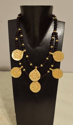 "This is a Vintage Czechoslovakian Purple Round Glass Bead Double Strand Necklace with Brass Middle Eastern Pendants and Beads all strung on wire with a gold hook and eye clasp. This necklace was part of the Bacara Jewelry Collection of 25 years ago. This is a a lovely necklace which is lightweight to wear and will compliment any outfit and looks fabulous on. A great gift to give that special someone. Necklace 22\" long outside strand 18\" inside strand Pendants 24mm long 30mm round Glass 8mm ro Double Strand Necklace, Necklace Purple, Handmade Brass, Lovely Necklace, Purple Glass, Glass Necklace, Strand Necklace, Beaded Pendant, Middle Eastern