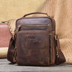 This smart leather messenger bag can be used as a daily hold-all, laptop bag, or briefcase. Its unique design is very attractive and it's made of high-quality, durable vintage leather. This type of leather is known as Crazy Horse. It's very soft and durable, yet wears in a unique way that gives it a true vintage feel. The internal structure of the satchel includes a zippered pocket, mobile phone pouch, document pouch, and tablet pocket. Its leather strap is adjustable. The interior is lined with Men's Messenger Bag, Sling Bag Men, College Bags, Mens Travel Bag, Vintage Leather Bag, Messenger Bag Men, Crazy Horse, Leather Messenger Bag, Shoulder Messenger Bag