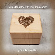 RING BOX playing your song THIS PROPOSAL BOX is custom made, playing your song in music box version,  THE PERFECT SIZE FOR A RING PILLOW BOX ON YOUR WEDDING DAY OR ENGAGEMENT!  This ring box is a sample and it's made to order and made of high quality USA maple!  You can choose the color, the song even the engravings if you'd like something else so you get a unique ring box that is one-of-a-kind!  This post includes this particular engraving on the box! But I'm opened to new ideas so please conta Heart Ring Box, Unique Ring Box, Engagement Box, Music Box Jewelry, Ring Bearer Pillows, Up Music, Proposal Box, Ring Pillow, Maid Of Honour Gifts