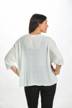 Grab this cardigan for all your layering needs. The lightweight material and open front make for a perfect top over a dress, tank or tee. Complete with a batwing design, you'll take this with you every time to leave the house. Made in Italy 55% Modal, 45% Acrylic Hand wash or dry clean only. Model Angie is 5’9” Bust: 38" Waist: 31" Hips: 42" and wearing a size medium. Lightweight Stretch Cardigan For Layering, White Oversized Open Front Top, Oversized White Fine Knit Tops, Versatile Batwing Sleeve Tops For Layering, Versatile White Cardigan For Day Out, Lightweight Long Sleeve Top For Fall, Versatile Lightweight Spring Tops, Oversized Open Front Top For Daywear, Casual Lightweight Open Front Tops