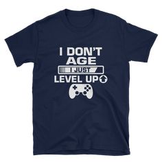 I Don't Age I Just Level Up Gaming Shirt, Gaming T-shirt, Gamers T-shirt, Gaming T-shirt, Gamer Shirt, Gamer Gift, Game Controller Shirt, Short-Sleeve Unisex T-Shirt You've now found the staple t-shirt of your wardrobe. It's made of a thicker, heavier cotton, but it's still soft and comfy. And the double stitching on the neckline and sleeves add more durability to what is sure to be a favorite! • 100% ringspun cotton • 4.5 oz/y² (153 g/m²) • Pre-shrunk • Shoulder-to-shoulder taping • Quarter-tur Basic Crew Neck Shirt With Funny Text, Black Short Sleeve Gamer Tops, Casual Funny Text Crew Neck T-shirt, Basic Crew Neck T-shirt With Funny Text, Casual Crew Neck T-shirt With Funny Text, Basic Short Sleeve Shirt With Funny Text, Black Gamer Top With Funny Text, Gamer Style Crew Neck T-shirt For Streetwear, Gamer Crew Neck Top With Letter Print