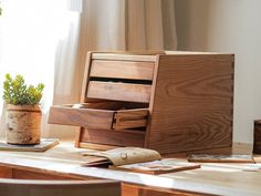 a wooden desk with some plants on it