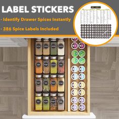 the label stickers are organized in an open drawer with spices and spice labels on it