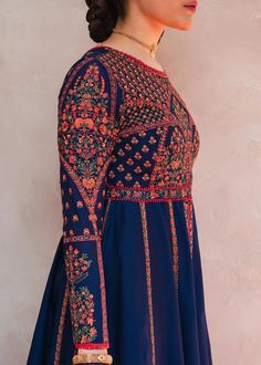 Pishwas Frock and Sharara Blue Pakistani Wedding Dress is a magnificent attire that will give you your desired magical look on the big day. Lavish designs, embroidery, and floral designs make this beautiful Pishwas Dress an epitome of beauty. Traditional Pishwas: The beautiful Pishwas Frock in blue color is adorned with ravishing intricate designs and floral details. Hand-crafted details of embroidery, tilla, and dabka make this stunning Pishwas Dress in premium lawn your priority for the weddin Designer Anarkali Dress With Intricate Embroidery, Georgette Dress With Multicolor Embroidery And Dabka Work, Anarkali Dress With Multicolor Embroidery For Wedding, Multicolor Embroidered Anarkali Set For Wedding, Semi-stitched Multicolor Embroidered Dress For Reception, Multicolor Embroidered Semi-stitched Dress For Reception, Anarkali Gown With Intricate Embroidery, Anarkali Wedding Set With Floral Embroidery, Anarkali Set With Floral Embroidery For Wedding