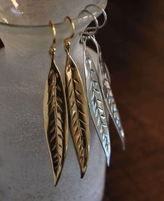 "When you don't know what to wear, these shiny sterling silver or gold vermeil earrings are a perfect choice. Lovely, long leaves match all and look great. Lightweight for everyday wear. Sterling silver or gold vermeil ear wires. Extra long 2 3/4 inch Long 2 inch Mini 1 inch return to shop all items http://www.etsy.com/shop/amyfine ask me anything you like here: http://www.etsy.com/convo_new.php?to_username=amyfine \"OMG I got my jewelry last night and it's AMAZING. I love it so much. I am weari Elegant Leaf-shaped Everyday Jewelry, Elegant Everyday Leaf-shaped Jewelry, Everyday Leaf-shaped Jewelry With Matching Earrings, Everyday Gold Leaf-shaped Jewelry, Everyday Gold Leaf Jewelry, Elegant Nickel-free Leaf-shaped Jewelry, Silver Leaf-shaped Brass Earrings, Don't Know What To Wear, Unusual Jewelry