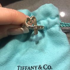 Beautiful Ring. Only Worn A Few Times. This Does Have A Single Diamond. Some Tarnishing But Tiffany Will Clean For Free. Comes With Pouch In Box With Ribbon. Size 5.5. Comes With Original Receipt Tiffany Love Ring Paloma, Jewelry Tiffany, Box With Ribbon, Loving Heart, Paloma Picasso, 5 Rings, Tiffany Co Jewelry, Beautiful Ring, Womens Jewelry Rings