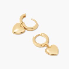 Love is in the air with these golden heart earrings. Showcase your sparkle and make a statement with these perfect pair of hearts – they'll bring the perfect hint of romance to any outfit. Available in 14k gold plated brass 1/2" huggie with 3/8" charm Hinge closure Protected with an anti-tarnish barrier SKU: BYE1165 Tarnish Resistant Heart Huggie Earrings, Tarnish Resistant Huggie Heart Earrings, Double Heart Huggie Earrings, Everyday Double Heart Huggie Earrings, Dainty Tarnish-resistant Huggie Heart Earrings, Trendy Heart Charm Earrings For Anniversary, Anniversary Small Hoop Huggie Earrings With Heart Charm, Valentine's Day Small Hoop Huggie Earrings With Heart Charm, Hypoallergenic Heart Shaped Huggie Earrings