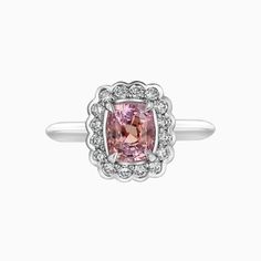 Padparadscha Sapphire Platinum Ring on a white background Diamond Cut Pink Sapphire Rings For Gifts, Pink Sapphire Cushion Cut Fine Jewelry Ring, Padparadscha Sapphire Ring, Luxury Pink Sapphire Diamond-cut Jewelry, Padparadscha Sapphire, Alexandrite Ring, Precious Jewels, Platinum Ring, Engraved Items