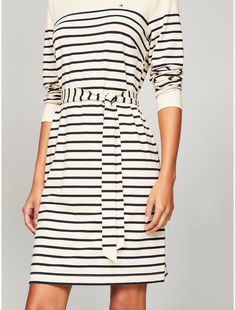 Tommy Hilfiger women's dress. For the office or weekends, the timeless stripe knit dress is a one-and-done favorite. Made from a soft-touch cotton-and-modal blend with a hint of stretch, this piece is designed in a belted, figure-flattering silhouette.  Material: 58% Cotton, 38% Modal, 4% Elastane. Dress For The Office, Striped Knit Dress, Tommy Hilfiger Women, Women's Dress, Striped Knit, Knit Dress, The Office, Tommy Hilfiger, Knitting