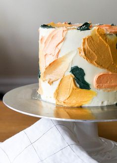 a close up of a cake on a plate with a napkin in front of it