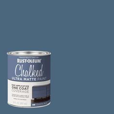 a blue paint can with the words chalked on it