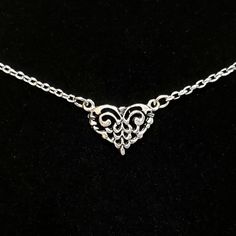 "- Gorgeous Filigree Connector Heart Pendant, or Necklace, in 925 Antique Sterling Silver Plated Pewter in Open-Cut design. See Photos #1-3. - Heart measures 5/8 x 3/4\". - Chain Length is 20\". - 925 Sterling Silver Filled Small Oval Rolo Chain. - Silver Plated EZ Toggle Clasp in Leaf motif for closure. See Photo #4. - We can customize the Clasp upon request at no cost. Choices include Lobster, Heart Toggle and Hook and Eye. Give us a Note on Etsy at Checkout with any change request. - Photos i Silver Open Heart Metal Necklace, Classic Silver Heart Pendant Necklace, Classic Silver Open Heart Jewelry, Classic Open Heart Silver Jewelry, Antique Silver Heart Jewelry With Oxidized Finish, Ornate Heart Charm Pendant Jewelry, Antique Silver Heart Pendant Necklace As Gift, Silver Metal Charm Necklaces For Wedding, Nickel Free Antique Silver Necklace For Anniversary