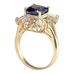 Stamped: 14K Yellow GoldTotal Ring Weight: 5.2 GramsRing Length: N/ARing Width: N/AGemstone Weight: Total Natural Tanzanite Weight is 2.18 Carat (Measures: 7.86x7.80 mm)Color: BlueDiamond Weight: Total Natural Diamond Weight is 1.26 CaratColor: F-G, Clarity: VS2-SI1Face Measures: 15.18x14.90 mmSku: [702848W] Yellow Gold Tanzanite Diamond Ring With Accent Stones, Yellow Gold Diamond Ring With Tanzanite In Prong Setting, Yellow Gold Tanzanite Diamond Ring With Halo Setting, Heirloom Tanzanite Rings In Yellow Gold, Heirloom Tanzanite Yellow Gold Rings, Gold Tanzanite Diamond Ring Fine Jewelry, Yellow Gold Tanzanite Rings With Accent Stones, Fine Jewelry Yellow Gold Tanzanite Rings, Gold Tanzanite Ring With Halo Setting