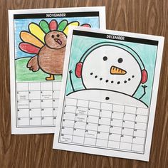 two calendars with the image of a snowman and a turkey on them, sitting on a wooden surface