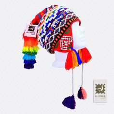 "This colorful Chullo is a handmade hat made by indigenous from the Andes in Pisac Cusco - PERU, woven in multicolored wool yarn, with ear flaps and decorated with beads all around, which are sewn one by one. This particular one has a design of the \"Andean Llama\",South American camelid from the Andean cultures. If laid flat, the Chullo alone is approximately 12\" long x 10.5\" wide. Including the pompoms on the bottom and all of the top, it measures from end to end 24\" approximately The CHULL Cusco Peru, Wool Thread, Ear Hats, Handmade Hat, Skull Cap Beanie, South American, Alpaca Wool, Sheep Wool, Winter Hat