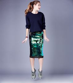 @Alexandra M What Wear - Sequin skirts don’t have to be synonymous with disco balls and American Hustle. Create a model-off-duty look by adding a slouchy knit top and colorful sneakers. Rodebjer Baluster Sparkle Skirt ($350); J Brand Jill Sweater ($395) in Duke; Vita Fede Mini Titan Bracelet ($225) in Silver; Dezso by Sara Beltrán Silver Andara Shark Tooth on Mexican Bracelet ($115); Dezso by Sara Beltrán Silver Andara Shell on Mexican Bracelet ($55); Nike Flyknit Lunar1+ Women’s Running Shoes ( Green Midi Skirt, 2014 Fashion Trends, Sequin Outfit, Skirt And Sneakers