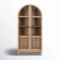 an arched wooden cabinet with drawers on the front and bottom shelves, against a white background