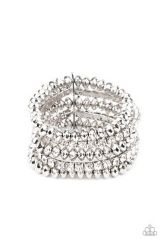 Held together with a sleek silver fitting, edgy rows of faceted silver beads and glittery white rhinestones are threaded along stretchy bands around the wrist, creating glamorous layers. Sold as one individual bracelet. Paparazzi Accessories Jewelry, Bracelet Set Silver, Pink Jewels, White Bracelet, Dainty Bracelet, White Bracelets, Jewellery Ideas, Classy Jewelry, Paparazzi Accessories