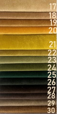 an assortment of different colored papers with numbers on them