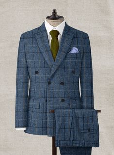 Channel boss vibes everyday with this refined Harris Tweed Gordon Blue Double Breasted Suit to look great in this new season. Crafted from wool, the suit is a stylish piece for your next elegant affair with a shade of blue that will help you charm your way through tedious tasks and an impeccable checks design that carries a timeless appeal. The suit will seamlessly blend together with your favorite shirt to create an eye catching ensemble. 
 
 Look Includes  Harris Tweed Gordon Blue Fabric  Doub Blue Double Breasted Suit, Boss Vibes, Checks Design, Cheque Design, Double Breasted Jacket, Harris Tweed, Blue Suit, Double Breasted Suit, Suit Fashion