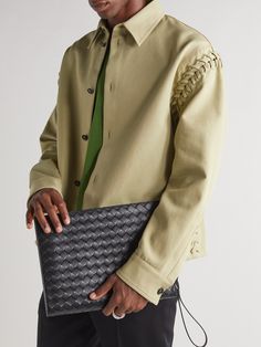 Bottega Veneta's 'Avenue B.' pouch is sized for a tablet, making it ideal for everything from boardrooms to travelling. It's made from black leather that's woven using the label's signature intrecciato technique and finished with a zipped pocket at the back. Designer Travel Clutch, Designer Clutch Pouch, Designer Pouch Bags For Work, Designer Pouch Bag For Workwear, Designer Work Pouch Bag, Designer Workwear Pouch Bag, Modern Business Pouch With Dust Bag Included, Designer Business Clutch Pouch, Designer Leather Pouch For Business