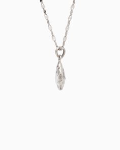 The Dewdrop Stone Pendant boasts a distinctively timeless design, featuring a pear-shaped white topaz stone cradled in sterling silver. Whether worn on its own for understated elegance or paired with a pair of Dewdrop Stone Earrings for a coordinated look, this pendant adds a touch of sophistication to any outfit. Pair with your favorite chain, sold separately. Metal: Sterling silver Stone: White topaz Dimensions: 20mm x 10mm Style #: P195W Pear-shaped White Gold Jewelry With Single Diamond, Pear-shaped Single Diamond White Gold Jewelry, Modern Pear-shaped Diamond Cut Jewelry, Classic Teardrop Pendant With Single Diamond Jewelry, White Teardrop Jewelry With Polished Finish, Classic Teardrop Pendant With Single Diamond, Modern Silver Teardrop Jewelry, Modern Teardrop Necklace For Anniversary, Timeless Teardrop Drop Necklace For Formal Occasions