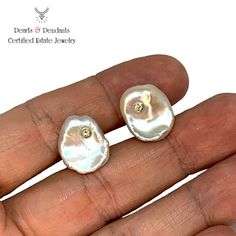 This is a Certified Designer Authentic Fine Quality Large FW Pearls and .08 TCW Diamond Cuff links set in Luxurious 14 KT Solid Gold with a total weight of 7.53 grams This is a One of a Kind, Unique, Custom Made Glamorous Piece of Jewelry!! Nothing says, “I Love you” more than Diamonds and Pearls.” This item has been inspected, certified, and appraised by Gemological Appraisal Laboratory Gemological Appraisal Laboratory of America is a proud member of: GIA Alumni Association National Association White Gold Diamond Cufflinks For Anniversary, Anniversary White Gold Diamond Cufflinks, Diamond White High Luster Jewelry For Anniversary, White Gold Round Cufflinks For Anniversary, Round Hallmarked Cufflinks For Anniversary, Silver Money Clip, Designer Cufflinks, Diamond Cufflink, Pearl Cufflinks