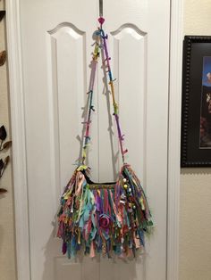 Upcycled Fringe bag,beaded,Custom Made,One Of A Kind,Hippie,BoHo,Funky,Purse BEFORE I start with my description i wanted to let you know I CAN WORK WITH ANY BUDGET. I can build a handbag to FIT ANY BUDGET. Just drop me a line and tell me what you want and i'll let you know what type/size/shape/design handbag i can produce for that amount. I can also do layaway plans with a deposit down PLEASE NOTE: The bag pictured has been sold. I can make another bag similar to it, but because my work is custo Festival Party Bags With Tassels, Party Bags With Tassels For Festivals, Multicolor Fringe Crossbody Shoulder Bag, Multicolor Fringe Crossbody Bag, Festival Fringe Shoulder Bag, Festival Fringe Hobo Shoulder Bag, Multicolor Fringe Bags For Festival, Multicolor Festival Bags With Fringe, Festival Multicolor Fringe Bags