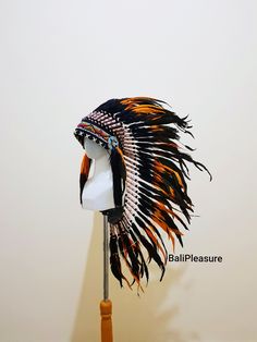 Black & Orange Feather Indian Headdress Replica This Headdress is 100% handmade from feathers. * Head circumference: 59 centimeters / 23 inches * Length : Medium * Beads color and pattern may vary each headdress WHY US? * 100% Handmade and Eco Friendly Product * Finest Quality - Each item will go through a Quality Control process before shipping. * No Markup Price * Every purchase supports Balinese Artisans - All Artisans will keep on following their passions while providing for their famili Black Bohemian Hat For Costumes, Black Bohemian Hat For Costume, Black Bohemian Costume Hat, Adjustable Feathered Headpieces For Costumes, Festival Costume Hats And Headpieces With Feathers, Festival Feathered Costume Hat, Festival Costume Hat With Feathers, Indian Hat, Eco Friendly Product