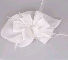 Elegant Blush sinamay Fascinator. Has clips for a secured and comfortable look. This will be a great way to add elegance to any, bridesmaid, rehearsal dinner, Wedding guest, cocktail party, or church - Rare find - Lightweight - Ready to ship - Fast Shipping - Free Shipping - Group discount available - Customize by adding different color flowers and or feathers - Headband and Hair clip It comes in other colors see their links below: PINK COLOR: https://www.etsy.com/HatsandPearls/listing/603380511 Kentucky Derby Cocktails, Ivory Fascinator, Pink And Red Dress, White Fascinator, Hat Tea Party, Fascinator Wedding, Kentucky Derby Fascinator, Blue Fascinator, Sinamay Fascinator