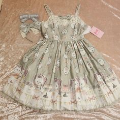 Angelic Pretty Cats Tea Party Grey Set Harajuku J Fashion Egl Dolly Kei Dollette Dolete Coquette Soft Girl Decora From Japanese Harajuku J Fashion Brand Angelic Pretty Iconic Dress This Is The 2nd Release Version Legend In The Egl Community Cats Tea Party Pockets On Side Shirring On Back All Over Print Details Includes Waist Ties, Choker, Headbow Set Print By Egl J Fashion Artist Kira Imai One Of The Most Popular Egl Prints Perfectly For Any Experienced Egl Dolly Kei Dollette Aesthetics Size/Qua Summer Costume Party Dress With Lace Trim, Kawaii Summer Dress With Lace Trim, Kawaii Sleeveless Party Dress, Sleeveless Kawaii Party Dresses, Kawaii Summer Dress For Costume Party, Summer Kawaii Dresses For Costume Party, White Kawaii Dress With Lace Trim, Whimsical White Sleeveless Dress, White Sleeveless Kawaii Dress