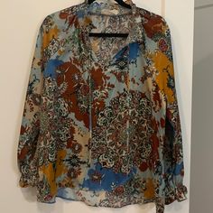 Bought, Took The Tags Off And Decided It’s Not My Look Great Fall Colors! Has A Stretch! Needs A New Home Measurements Approximately Pit To Pit 22” Length 26” Fall Paisley Print Tops For Work, Fall Paisley Print Work Tops, Blue Paisley Print Top For Fall, Blue Floral Print Shirt For Fall, Long Sleeve Tops With Paisley Print For Work, Casual Brown Paisley Print Tops, Fall Multicolor Paisley Print Blouse, Brown Floral Print Long Sleeve Tops, Brown Long Sleeve Floral Print Tops