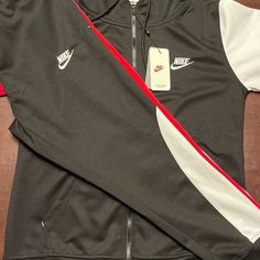 Nike Sportswear Tech Suit Xl Black/White/Red Brand New Jogger Sweatsuit Never Used. Makes A Great Gift For That Special Someone Or You Can Style Yourself In This Fit. Black Long Sleeve Athleisure Tracksuit, Winter Fitted Track Jacket For Jogging, Black Long Sleeve Sporty Tracksuit, Black Hooded Tracksuit For Sports, Black Hoodie For Jogging, Black Tracksuit For Sports In Winter, Black Winter Sports Tracksuit, Fitted Black Tracksuit For Winter, Nike Winter Sports Tracksuit