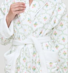 You know that feeling when you wake up in a hotel room and throw on a cozy oversized robe to eat a leisurely breakfast? We wanted to bring that vacation feeling home, so we made the Hotel Robe. Each robe is super soft, ultra-absorbent, and made in Portugal from 100% Zero Twist Micro Cotton. About the print: Inspired by 17th-century French textiles and delicate garden trellises, this print sold out almost instantly when it was featured in our English Garden drop in February 2021.We got so many re Womens Bath Robe, French Textiles, Robe Women, Pajama Day, Maternity Pajamas, Hill House, Women's Robe, Makeup Stain, That Feeling