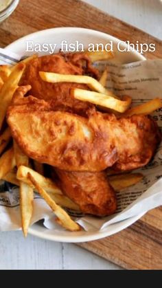 fish and chips on a plate with ketchup