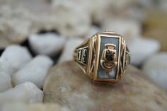 This is the perfect option for those who like cool, unique jewelry, and the luxury, shine of gold. This ring is well made, cute and/or elegant in design, and very desirable. The vintage ring decorated with the emblem in the center and signed ''1947''. The ring has a hallmark, 10k BBCC ELG. Its weight is 4.5 grams and is a size 5 1/4. In good condition. Everyone interested in the jewelry should remember that he or she must like their jewelry- not just at first sight.... but for always. To have it Gold Signet Ring With Maker's Mark As Gift, Heirloom Enamel Jewelry With Engraving, Heirloom Engraved Enamel Jewelry, Heirloom Enamel Engraved Jewelry, Art Deco Polished Signet Ring As Gift, Antique Enamel Jewelry For Anniversary, Heirloom Enamel Jewelry For Anniversary, Gold Vintage Signet Ring For Commemoration, Yellow Gold Jewelry With Maker's Mark As Gift