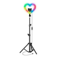 a tripod light stand with a heart on it's top and two lights in the middle