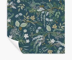 a blue floral print fabric with pink, yellow and green flowers on it's side