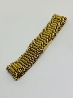 "This is a beautiful, vintage 14K yellow gold bracelet. Material(s) 14K yellow gold Measurements: This bracelet measures 7 inches in length and 14.3 millimeters in width. Weight: 24.6 grams Markings: \"14K\" If you have any questions about this bracelet, please do not hesitate to contact us! ♥" Antique Yellow Gold Jubilee Bracelet, Yellow Gold Band Bracelet For Formal Occasions, Formal Yellow Gold Bracelet With Decorative Band, Rectangular Gold Bracelet With 17 Jewels, Antique Yellow Gold Bracelets For Formal Occasions, Antique Yellow Gold Bracelet For Formal Occasions, Vintage Gold Bracelet With Bracelet Strap As A Gift, Vintage Gold Bracelet As Gift, Gold Jubilee Bracelet Band