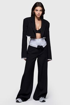 Cut from cropped blazer with lapel collar and long sleeve, the suit features unfinished trims for a touch of sophistication. Paired with high waisted trousers with wide legs and front button closure, this suit is the ideal addition to any wardrobe.Fabric: Cotton, Polyester Blazer With Crop Top Outfits, Style Cropped Blazer, Crop Blazer Outfit, Cropped Suit, Goth Prom, Blazer Outfits Casual, Crop Blazer, Crop Top Outfits, Cropped Blazer