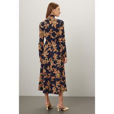 Multicolor floral (55% Rayon, 30% Polyester, 5% Elastane). A-line. Long sleeves. Turtleneck. Back zipper closure. 49.5" from shoulder to hemline. Imported. Elegant A-line Floral Dress For Fall, Fall A-line Maxi Dress For Brunch, A-line Midi Dress For Fall Brunch, Fall A-line Midi Dress For Brunch, Floral Print A-line Midi Dress For Garden Party, A-line Midi Dress With Floral Print For Brunch, Elegant Floral Print Fit And Flare Midi Dress, Elegant Fall Floral Print Dress, Elegant Floral Dress For Fall Garden Party