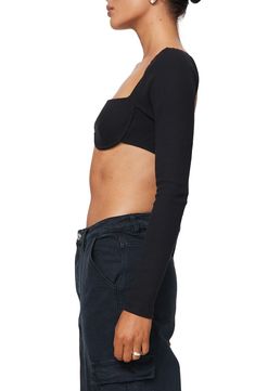 Be date-night ready in this cool cropped top designed with a square neckline and allover ribbing. Square neck Built-in underwire bra Long sleeves 75% polyester, 20% rayon, 5% elastane Machine wash, dry flat Imported Bra Friendly Cropped Top For Night Out, Bra-friendly Cropped Tops For Night Out, Chic Fitted Crop Top With Straight Neckline, Fitted Crop Top With Straight Neckline For Spring, Fitted Square Neck Crop Top For Night Out, Fitted Square Neck Top Bra Friendly, Fitted Elastane Crop Top For Night Out, Fitted Seamless Tops With Straight Neckline, Trendy Tops With Built-in Bra And Square Neck