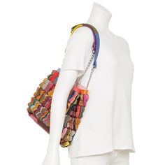 You'll love the colorful style of this AmeriLeather Papillon leather shoulder bag. You'll love the colorful style of this AmeriLeather Papillon leather shoulder bag. DETAILS 14.5"L x 11.25"H x 6.25"W Handle: 12'' drop Magnetic snap closure Silver-tone hardware Interior: 1 zip pocket, 2 slip pockets Water repellentCONSTRUCTION & CARE Exterior: leather Lining: polyester Wipe clean Imported Size: One Size. Color: Multicolor. Gender: female. Age Group: adult. Material: Cotton. Trendy Leather Shoulder Bag As Fashion Accessory, Multicolor Leather Rectangular Hobo Bag, Multicolor Leather Bucket Shoulder Bag, Multicolor Leather Satchel With Adjustable Strap, Multicolor Leather Crossbody Satchel, Multicolor Leather Shoulder Bag For Daily Use, Colorful Leather Shoulder Bag For Everyday Use, Multicolor Leather Shoulder Bag, Trendy Multicolor Hobo Bag