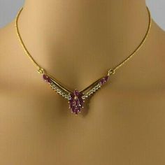 22K Yellow Gold Ruby Marquise and CZ Chevron Necklace, 15 marquise rubies, 2.5x6mm, 16 round CZ brilliant stones, 16 inch length, 2 inch chevron pendants, S hook handmade, Circa 1990, 13.15 grams Stock # BB261N06 This listing contains photographs of the actual item you will receive. Our items are in excellent condition with little or no signs of wear and many are one of a kind pre-owned estate finds. Please look closely at the pictures in this listing as they are part of the product description. Trendy Silver Jewelry, Chevron Necklace, S Hook, Fine Jewelry Designers, Yellow Gold Earring, Gold Coins, Earring Backs, Jewelry Necklace Pendant, Silver Jewelry