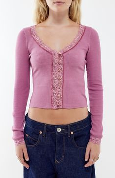 A button-and-loop closure secures the front of this lace-trimmed cardigan textured with soft, curve-hugging ribbing. 20" length (size Medium) Exclusive retailer Front button-and-loop closure V-neck Long sleeves 60% cotton, 40% polyester with 93% nylon, 7% elastane contrast Machine wash, line dry Imported Girly Fall Fashion, Long Sleeve Button Up, Twee Clothes, V Neck Cardigan Outfit, Flora Outfits, Long Sleeve Outfit Ideas, Sumner Outfits, Fall Outfits Pink, 2000s Cardigan