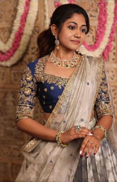 Lehenga Designs Receptions, Indian Jewellery Design Traditional, Half Saree For Marriage, Blue Langa Voni, Engagement Wear For Bride, Jewellery With Blue Lehenga, Lehenga Neck Designs, Gold Blouse Saree, Blue Maggam Work Blouse Designs