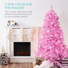 a pink christmas tree in front of a fireplace