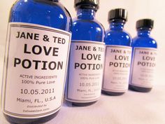 five blue bottles with labels on them that say jane & ted love potton and are lined up next to each other