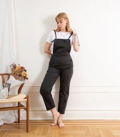 The Knot Overalls are our latest version of our flattering overalls collection! Made from stretch washed Black twill and featuring a waistband at the natural waist, front and back pockets, side zipper and adjustable knotted straps. FIT NOTE: The measurements below are of the actual pants. These are made with stretch fabric and will fit up to 2" bigger if needed as they will stretch to fit your body. If you want a tight snug fit, we suggest buying these in the smallest size that will fit as they Workwear Overalls With Adjustable Straps, Cotton Overalls With Slip Pockets For Workwear, Casual Cotton Overalls With Belt Loops, Utility Cotton Denim Jumpsuit With Belt Loops, Utility Style Cotton Denim Jumpsuit With Belt Loops, Bottoms With Adjustable Straps For Workwear In Spring, Cotton Workwear Overalls With Slip Pockets, Utility Denim Overall Jumpsuit With Adjustable Straps, Utility Overalls With Belt Loops